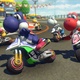 Yoshis riding a motorbike down a track.